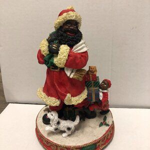 Clothtique Possible Dreams 10" Black Santa child dog sled presents music player